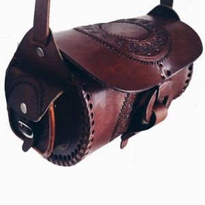Leather tooled barrel bag